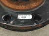 Flange face showing label sticker reading '150# SW RF STD A105' with barcode and number 2711, bolt holes visible on flange face