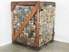 Large wooden crate pallet packed floor-to-ceiling with hundreds of small plastic parts bins — full front view