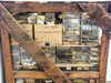 Crate section showing cardboard boxes labeled '556-BH35-1 Cover Recording Chamber' and 'Fairchild' with additional parts bins