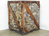 Large wood-and-wire pallet crate packed floor-to-ceiling with hundreds of small labeled parts bins — full crate front view