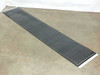Solopower SP1 60W flexible thin-film CIGS solar panel laid flat on the floor showing full 86.5-inch length