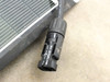 Close-up of MC4 female connector on Solopower SP1 solar panel cable showing socket end with STOP locking mechanism