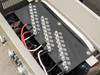 Close-up of internal multi-tap transformer terminal board showing voltage tap labels ranging from 346V to 480V primary with corresponding secondary taps
