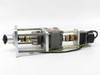 Sankyo Sandex P50 parallel indexing drive assembly – left-side 3/4 view showing bevel gear output and yellow ground wire