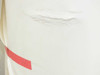 Close-up of torn and damaged protective layer on glass roll showing large surface tear with red tape marker below