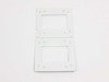 Single 35mm plastic slide mount frame shown open flat, displaying two snap-close halves with rectangular film aperture windows and alignment posts