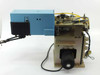 Laurier HA245 die loader pick and place unit – left-side view showing blue housing, large DC motor at base, linear mechanisms, and wiring