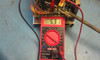 Semtrol PS105-21 being tested with Cen-Tech digital multimeter reading 5.31 VDC on the +5V output terminal