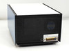 UTI 100C RF Generator Quadrupole Mass Spectrometer front-left view showing perforated black enclosure and multi-pin connector panel
