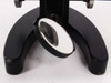 Alternate view of horseshoe base and substage mirror; paint loss on base feet clearly visible