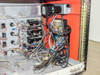 Technics West PE-IIGM Mass Flow Module interior left side showing wiring harness detail, transformer, relay boards, and cable routing