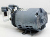 Gast 0211-103A-G8C vacuum pump — rear-right view showing motor end cap and rating plate label