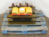 Dongan 83-75-6750CC 75kVA Three Phase Transformer full rear three-quarter view on pallet showing coil assembly, base frame, and terminal block