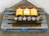 Dongan 83-75-6750CC 75kVA Three Phase Transformer on pallet – front three-quarter view showing three yellow coil windings, red top bus bar, and multi-lug terminal block