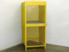 Jamco CA080 yellow expanded-metal vertical gas cylinder storage cabinet, front three-quarter view showing two-section doors and blue plastic shelf