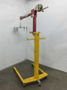 Thern 5122 Portable Davit Crane side view – yellow caster base, red vertical column, boom arm with cable and hook extended