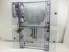 Exair 110018SS automated housing – front panels open revealing large circular aluminum disc assembly upper half and Exair air knife body lower half with wiring compartment