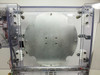 Exair 110018SS housing interior – full view of large circular aluminum disc/plate with bolt pattern, Exair air knife label visible at bottom edge