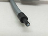 Close-up of extra tip cable end — smaller black ferrule with single fiber optic tip
