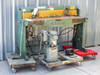 Wysong 1652 16-gauge hydraulic foot shear — full front view showing green machine body, yellow crossbeam, hydraulic pump unit, and foot pedal on wooden dolly