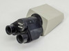 Nikon binocular microscope head – front-right angle view showing Nikon Japan label and interpupillary scale dial