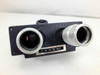 Front face of binocular microscope head block showing dual eyepiece openings and IPD interpupillary scale reading 68–73mm