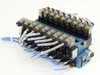 MAC 45A-NAC-DDFJ-2KD 10-valve solenoid manifold — top-right angled view showing full valve row, wiring harness, and blue tubing connections