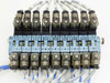 MAC 45A-NAC-DDFJ-2KD solenoid valve manifold — front-facing view of all 10 valve stations on blue manifold base with blue tubing