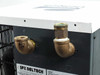 SPX Deltech HG25-115 top rear close-up showing two brass 90-degree NPT elbow fittings for compressed air inlet and outlet connections