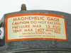 Dwyer 2040C Magnehelic Gauge – side label showing Magnehelic Gage caution plate: Pressure Max 15 PSIG, Temp Max 140°F Min 30°F, Dwyer Instruments Michigan City IN