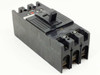 Unbranded 3-pole MCCB circuit breaker — front right angle view showing red trip indicator button and toggle handle