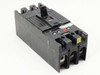 Unbranded 3-pole heavy duty molded case circuit breaker — front left angle view showing toggle handle and line terminals