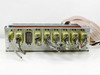 First Light Technology I/O chassis rear panel view showing large multi-pin connector, circular JG4/JB4/JF4 connectors, and attached cables