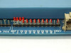 Rugid Computer RUG7C bottom edge I/O closeup — DI1–DI8 digital input pin headers, GND, KEY connector, red LED status indicators