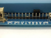 Rugid Computer RUG7C bottom edge I/O closeup — XMT+/-, RCV+/-, LF serial pins, AI1–AI4 analog input headers, AO0 analog output header