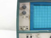 Tektronix T922 upper-left front panel close-up — Intensity knob, Focus knob, Beam Finder button, Power switch, and Probe Adj terminal visible