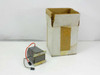 Apple 076-8119 power transformer for AppleColor Monitor 100 shown next to its original white cardboard box