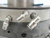 AWM Netstal injection mold head – closeup of angled push-in fittings on mold body with stamped port labels L7 and related markings