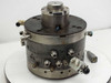 AWM Mold Tech AG Netstal DC injection mold head – front three-quarter view showing cylindrical body, top chuck, pneumatic fittings, and attached connector