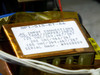 Scientific Atlanta 7550A internal transformer label showing QPT-515-ET-66, AC input connections for 120 VAC, 240 VAC, and 100 VAC with jumper configuration instructions