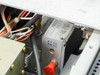 Scientific Atlanta 7550A internal chassis close-up showing crystal tune module labeled '1042.5 MHz', part number P-11162, assembly 330034 Rev C, with XTAL TUNE adjustment