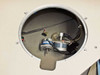 Interior view of PWS P5NMS wafer chuck cavity showing stepper motor, vacuum tubing, and wiring harness below the chuck surface