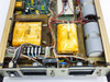 Interior close-up of TCR 150S7 power supply showing wound transformers OL646 and OL441, control board, and power components