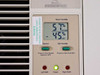 EssickAir Bemis humidifier digital control panel close-up showing LCD room humidity 57% and set humidity 45% display