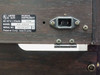 Roland KR-4500 rear panel showing IEC AC inlet, rating label with serial ZE34341, and hinge hardware — no power cord attached