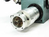 BD-103-005 indexing drive output shaft end — close-up of cylindrical aluminum housing with flanged face plate and central shaft showing surface oxidation