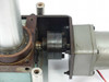 Tung Lee 4RK25GN-C motor and gearhead interior – side cover removed showing internal gear cluster and coupling between motor and indexing drive