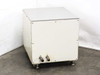Custom water filtration enclosure rear view showing two threaded inlet and outlet hose-barb fittings at lower right