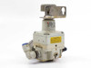 SMC IR2000-02 regulator rear-right view showing model label, yellow caution sticker, and mounting bracket