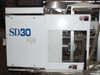 Sumitomo SD30 – front clamping side panel showing SD30 logo and safety door with window